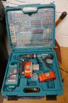 Makita drill in case with accessories