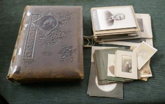 Well populated Victorian photo album together with loose photos