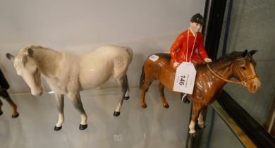 Beswick mare together with Beswick huntsman atop horse