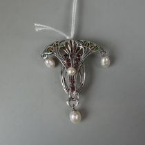 Plique-à-jour enamel and silver brooch set with pearl and ruby