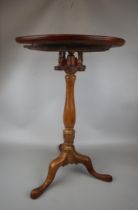 Antique walnut tilt top tripod table with birdcage movement