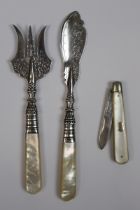 Hallmarked silver and mother-of-pearl handled fish knife and fork set together with a mother of