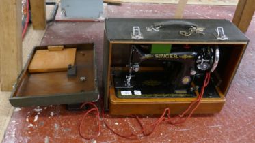 Electric singer sewing machine in case with accessories