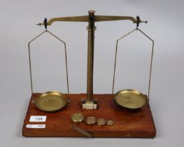 Set of balance scales with brass weights