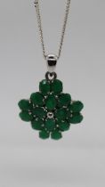 Silver and emerald pendant on silver chain