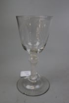 Georgian wine glass with a round funnel bowl on a double knopped opaque twist stem with conical foot