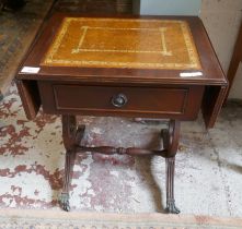 Small tan leather top drop leaf side table with brass casters