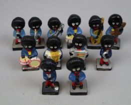 12 Robinson Jolly Golly band figurines These items are listed on the basis they are illustrative