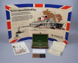 Cased Parker 75 from RMS Queen Elizabeth together with a vintage Parker advertising display - Approx