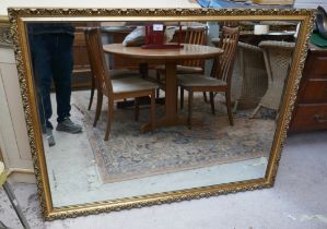 Large gilt framed bevelled mirror