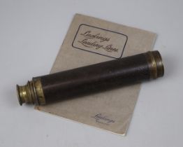 Leather and brass telescope with Luckings catalogue