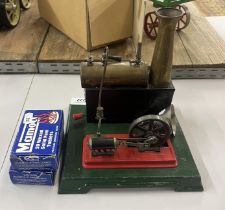 Small stationary engine together with 2 boxes of waxed solid fuel tablets