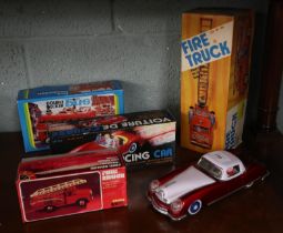 Collection of friction vehicles in original boxes together with one unboxed
