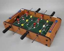 Mini table-top football game