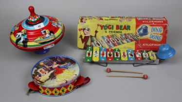 3 tinplate toys to include spinning top
