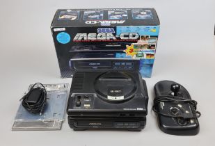 Sega Mega Drive and Mega CD in box