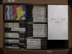 PlayStation 2 together with appox 103 games & accessories