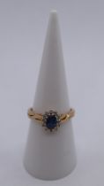 9ct gold diamond and sapphire cluster ring - Size M½