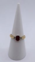 18ct gold ruby and diamond set ring - Size L