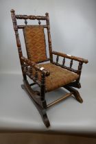 Antique Victorian oak child/doll's American rocking chair