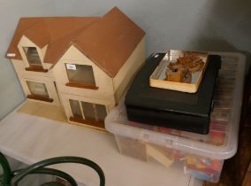 Dolls house with dolls, furniture, clothes etc