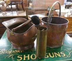 Brass and copper coal scuttle together with WW1 shellcase, poker and brush