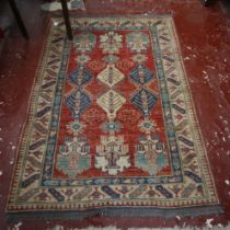 Red and blue patterned rug - Approx size: 176cm x 127cm