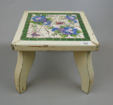 Small stool with interesting tile top