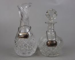 2 decanters with collars - one silver