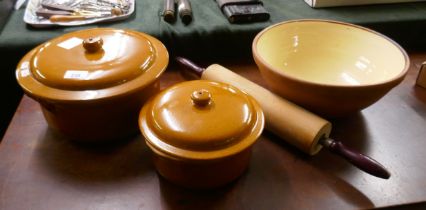 2 large casserole dishes together with an old large mixing bowl and rolling pin