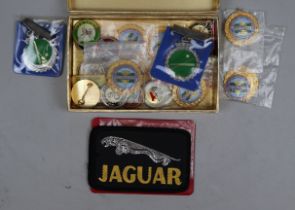 Collection of car badges and patches etc