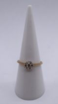 Pretty 9ct gold diamond cluster ring - Size M½