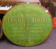 Wooden advertising plaque - Hardy Bros Ltd - Approx diameter: 80cm