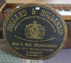 Wooden advertising plaque - Holland and Holland Ltd - Approx diameter: 80cm