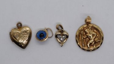 4 gold pendants - one to include diamonds