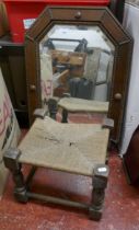 Oak framed bevelled glass mirror together with rush seated foot stool