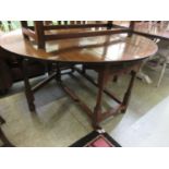 A high quality circular drop leaf table