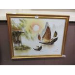 A modern gilt framed oil on canvas of sailing vessels signed bottom right