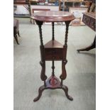 A reproduction mahogany washstand