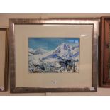 A framed and glazed oil painting of a mountain scene signed Hawkins