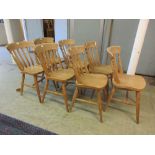 A set of seven beech kitchen chairs