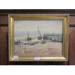 A gilt framed oil on canvas of estuary scene signed G Unsworth