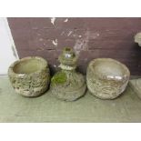Two composite stone garden pots with floral design along with one pedestal