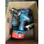 A Makita cordless drill along with one other