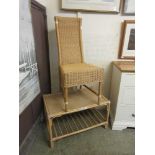 A bamboo and wicker chair along with associated table