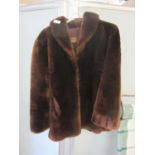 A Lucian Michat brown fur jacket
