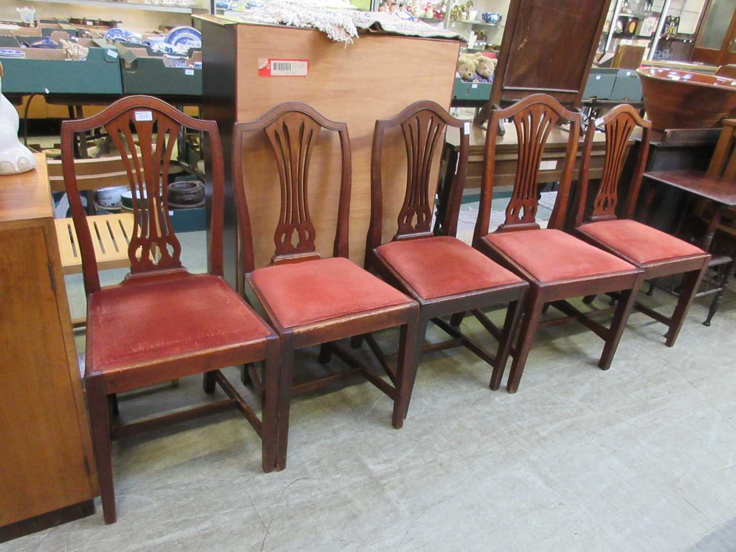 A set of four early 20th century mahogany high back dining chairs