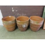 Six terracotta garden pots