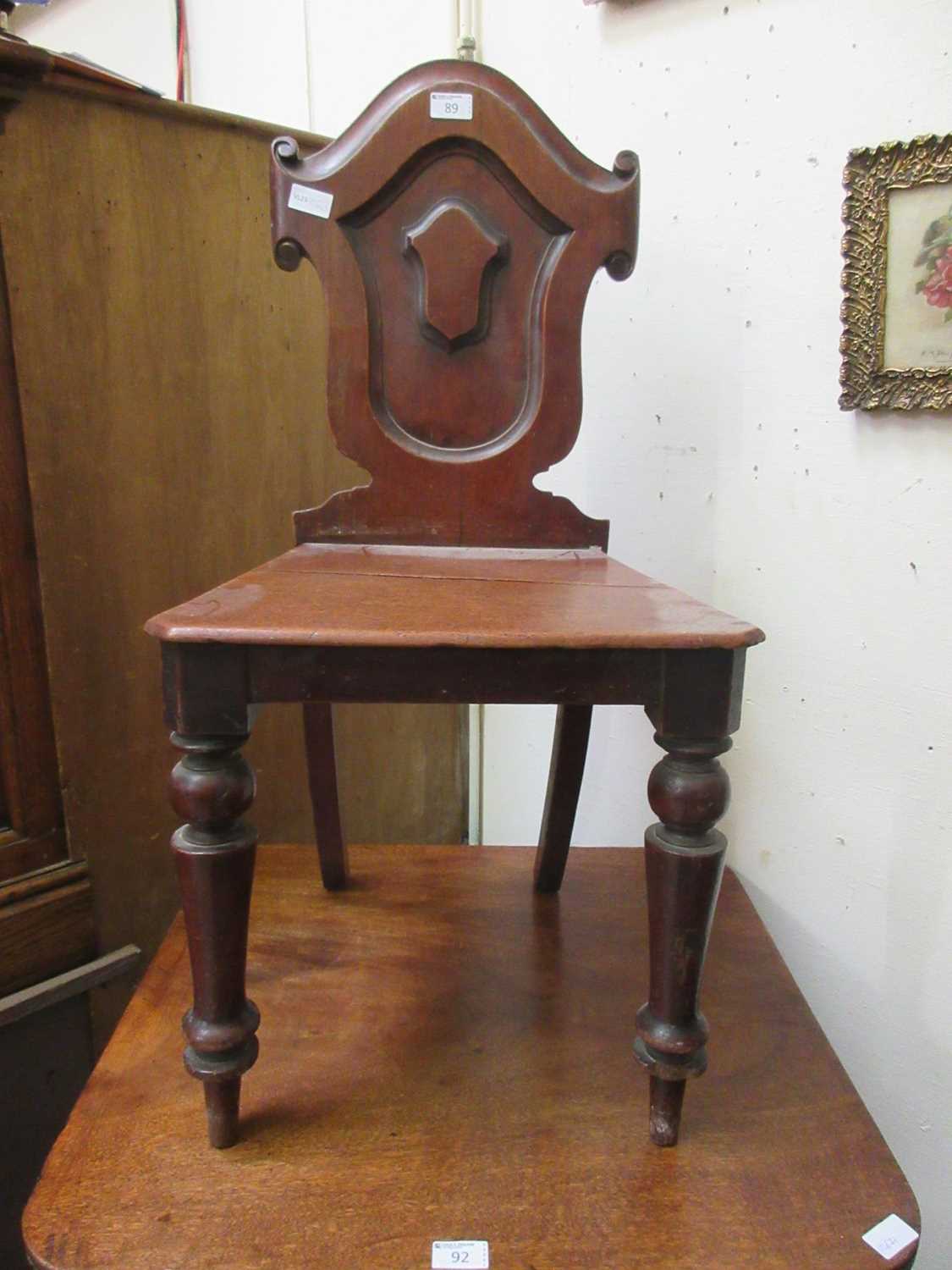 A 19th century mahogany shield back hall chair