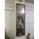 A pine framed rectangular mirror